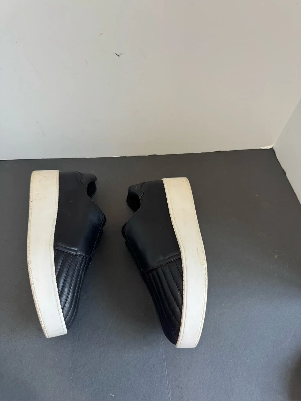Donna Karan New York black leather slip-on sneakers. Size 6